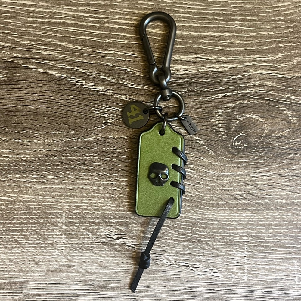COACH leather keychain with skull motif, whipstitch, and “41” charm